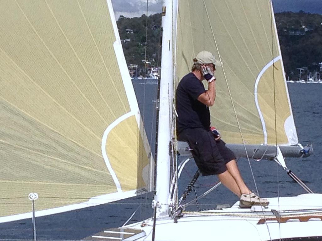 Yeah mum sorry not much wind out here, might be late for tea - 2013 Young 88 New South Wales Champs © Julian Todd